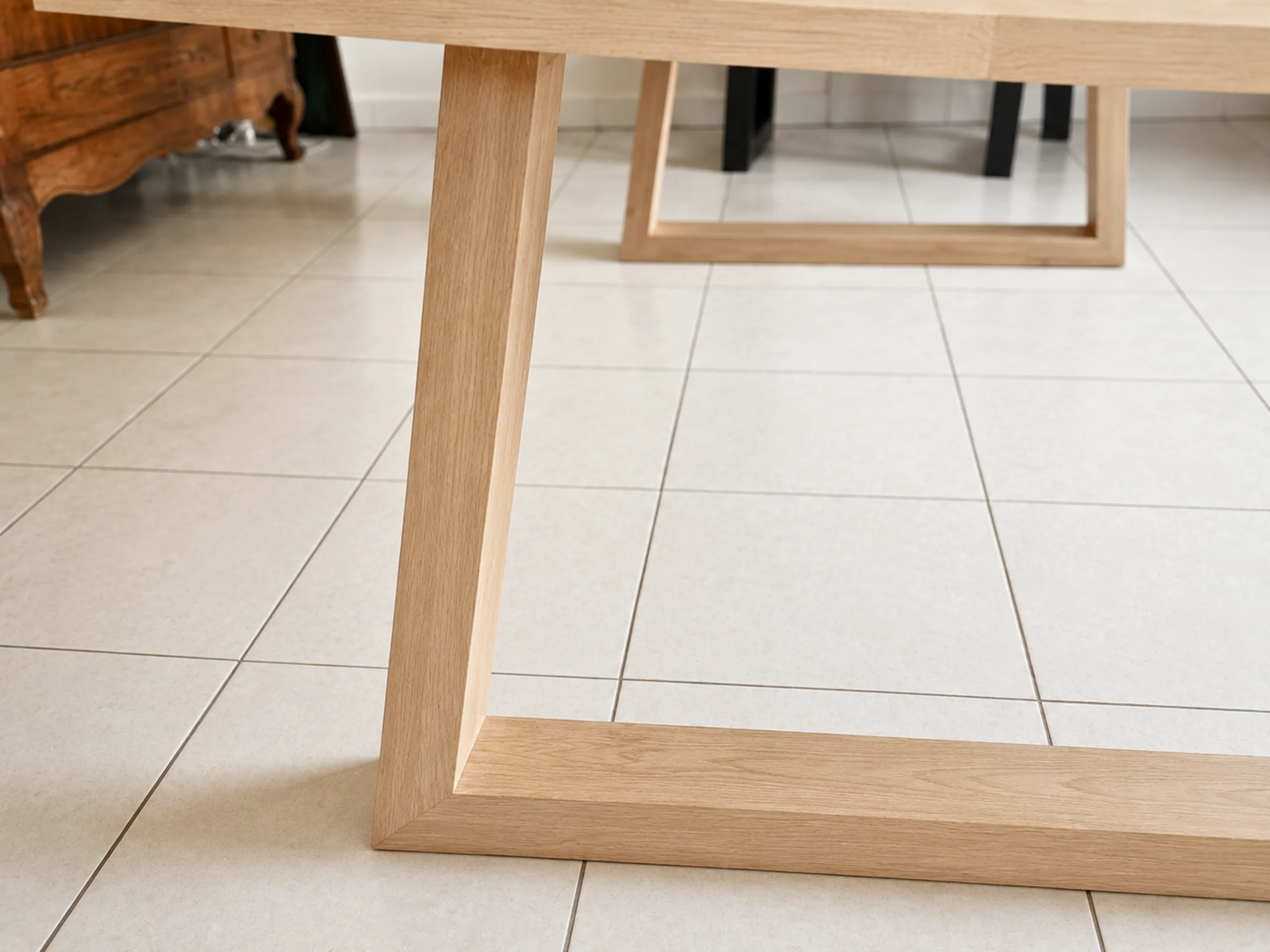 A solid wood table leg