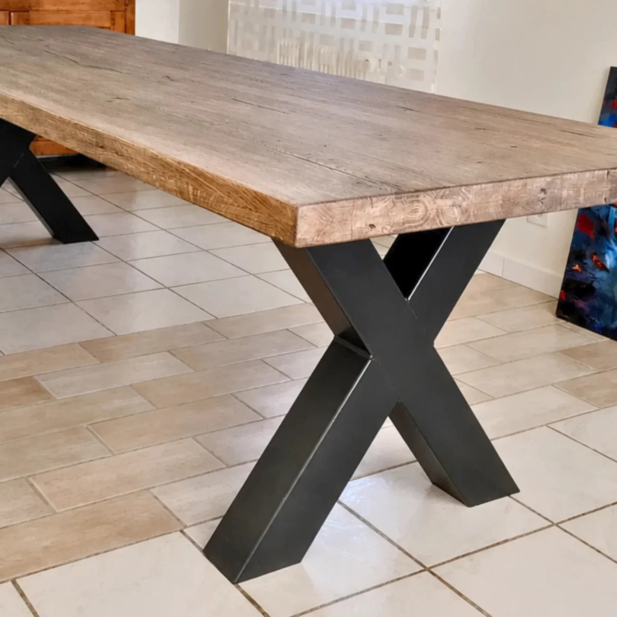 Un pied de table en croix
