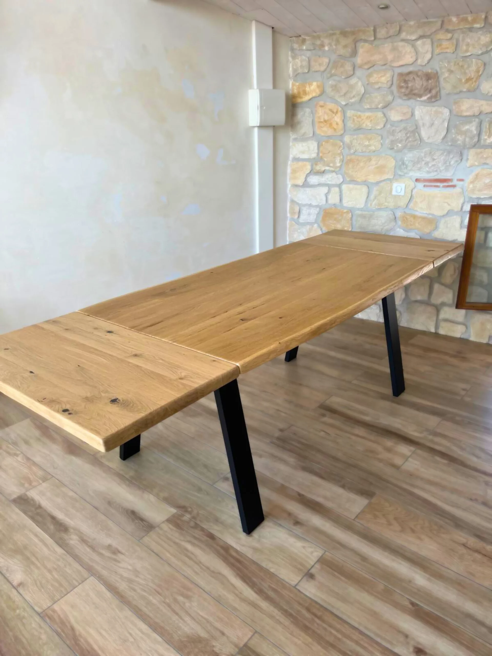Un système de rallonge pour table en chêne